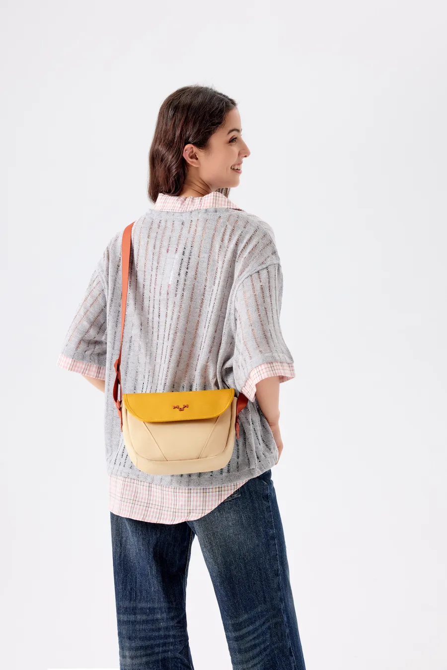 A model wearing a MaH bag from the spring/summer 2026 collection